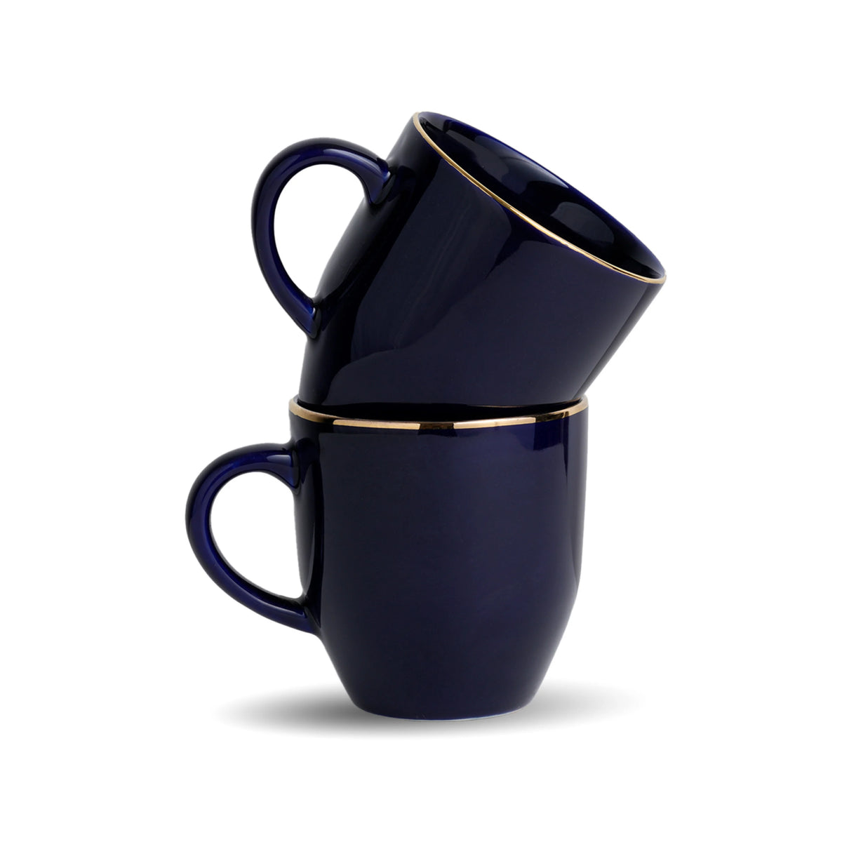 Two navy blue mugs with gold rims stacked on a white background