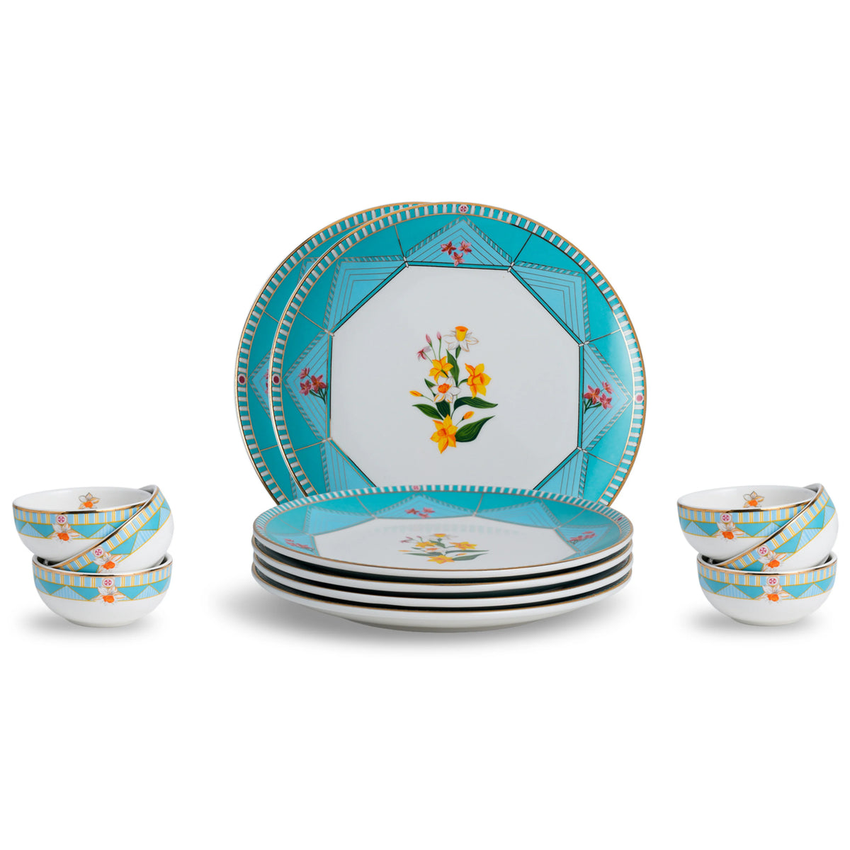 Set of ceramic plates and bowls with floral design on a white background