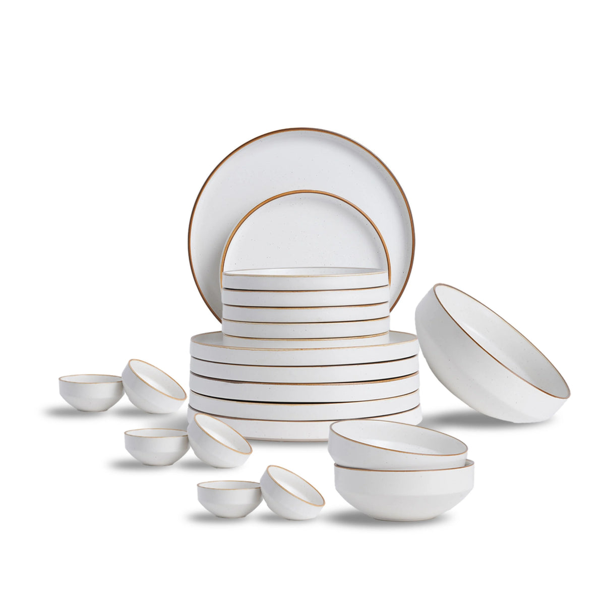 White ceramic dinnerware set with gold rims on a white background