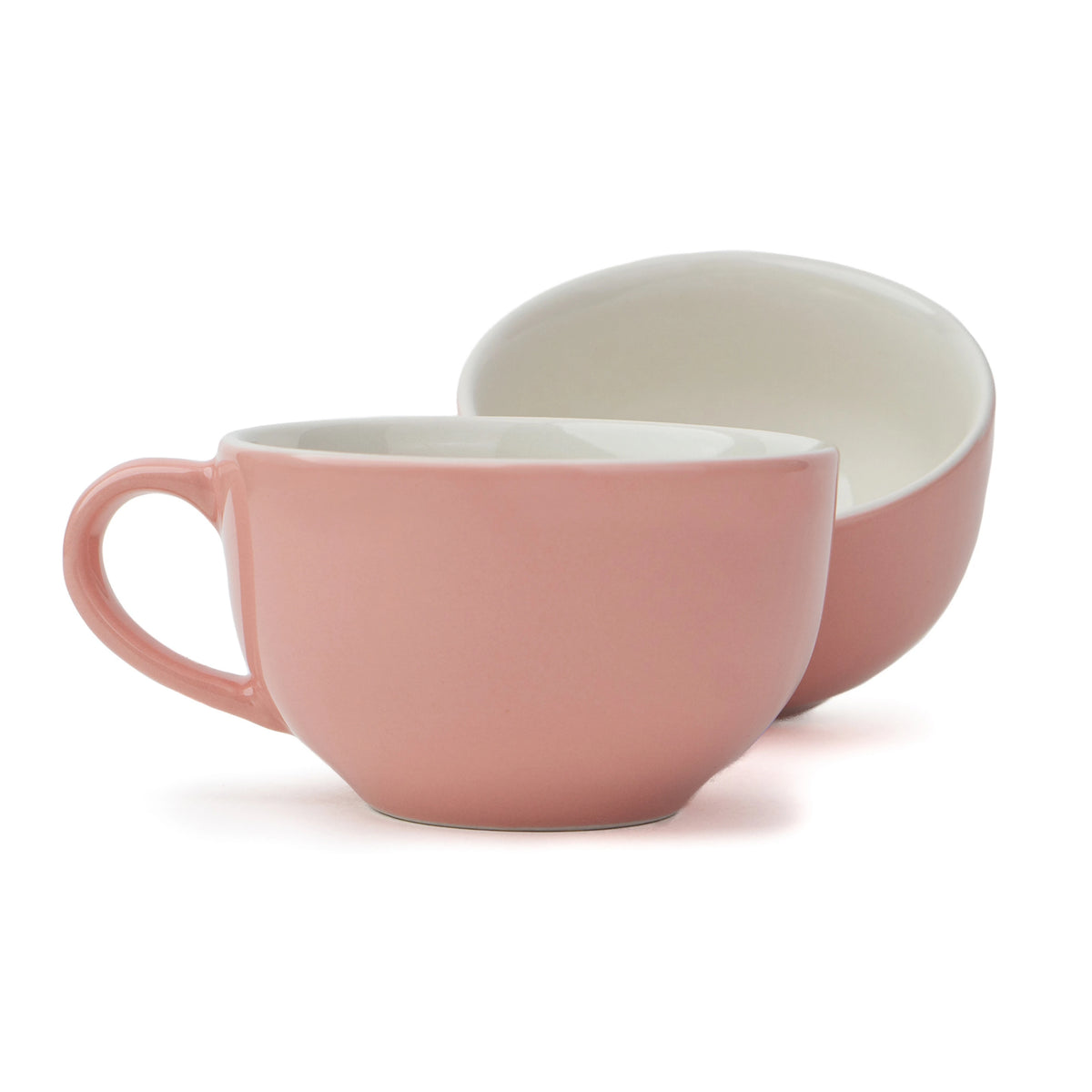 Two pink ceramic mugs on a white background