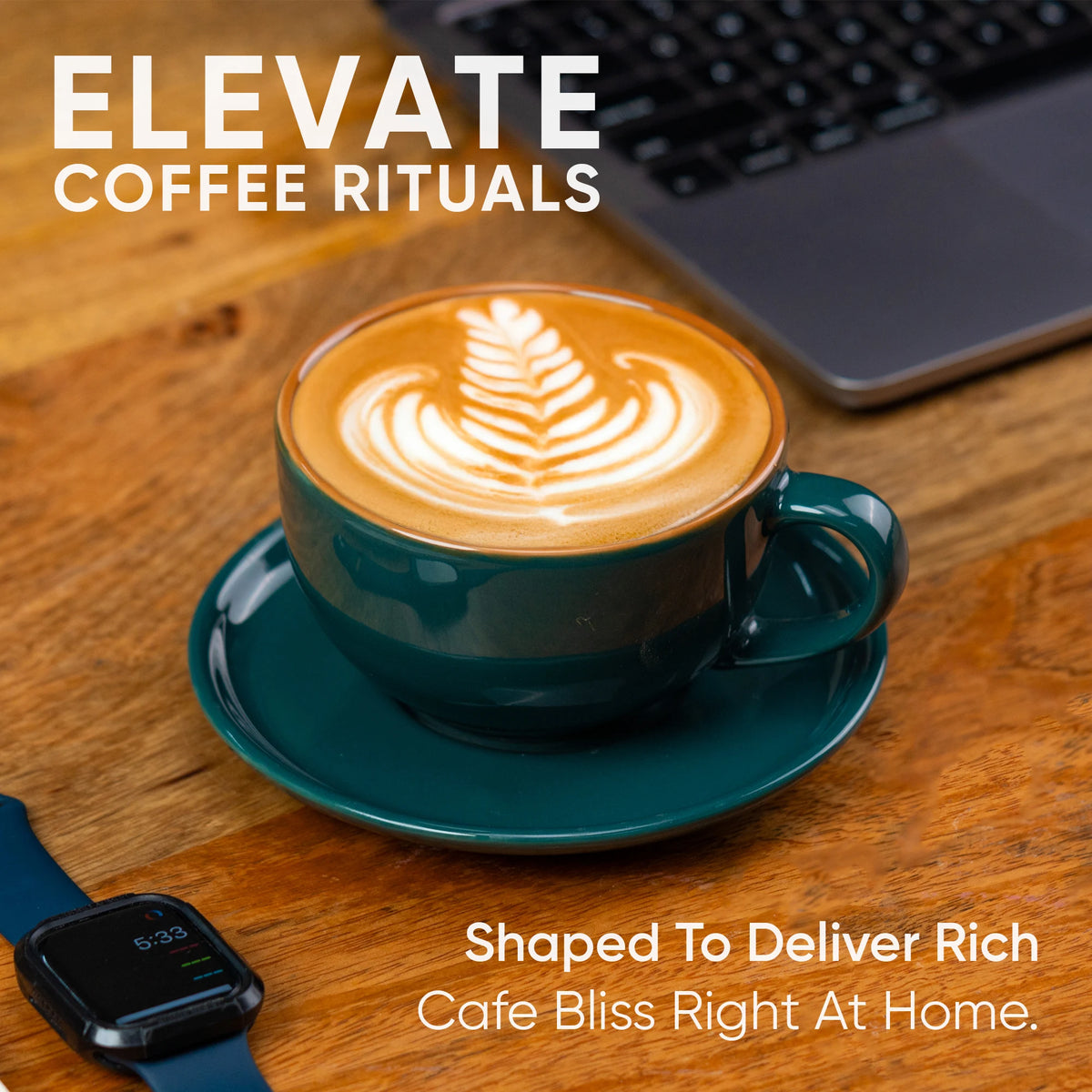 Cappuccino in a teal cup on a wooden table with text 'Elevate Coffee Rituals' and 'Shaped to deliver rich cafe bliss right at home'.