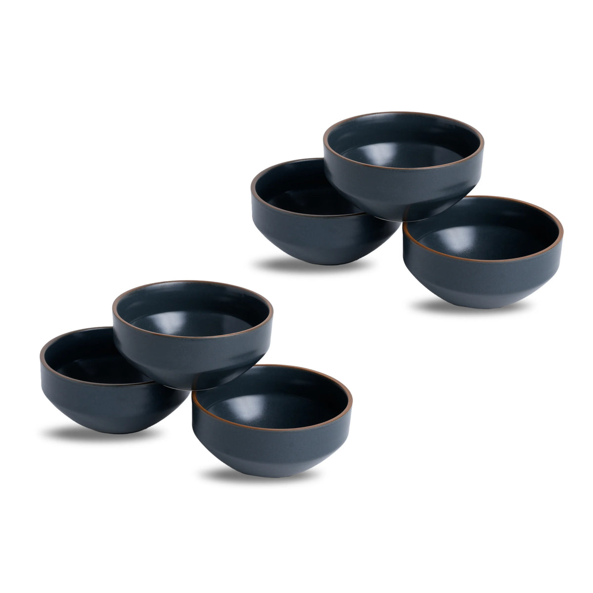 Set of five dark blue ceramic bowls on a white background