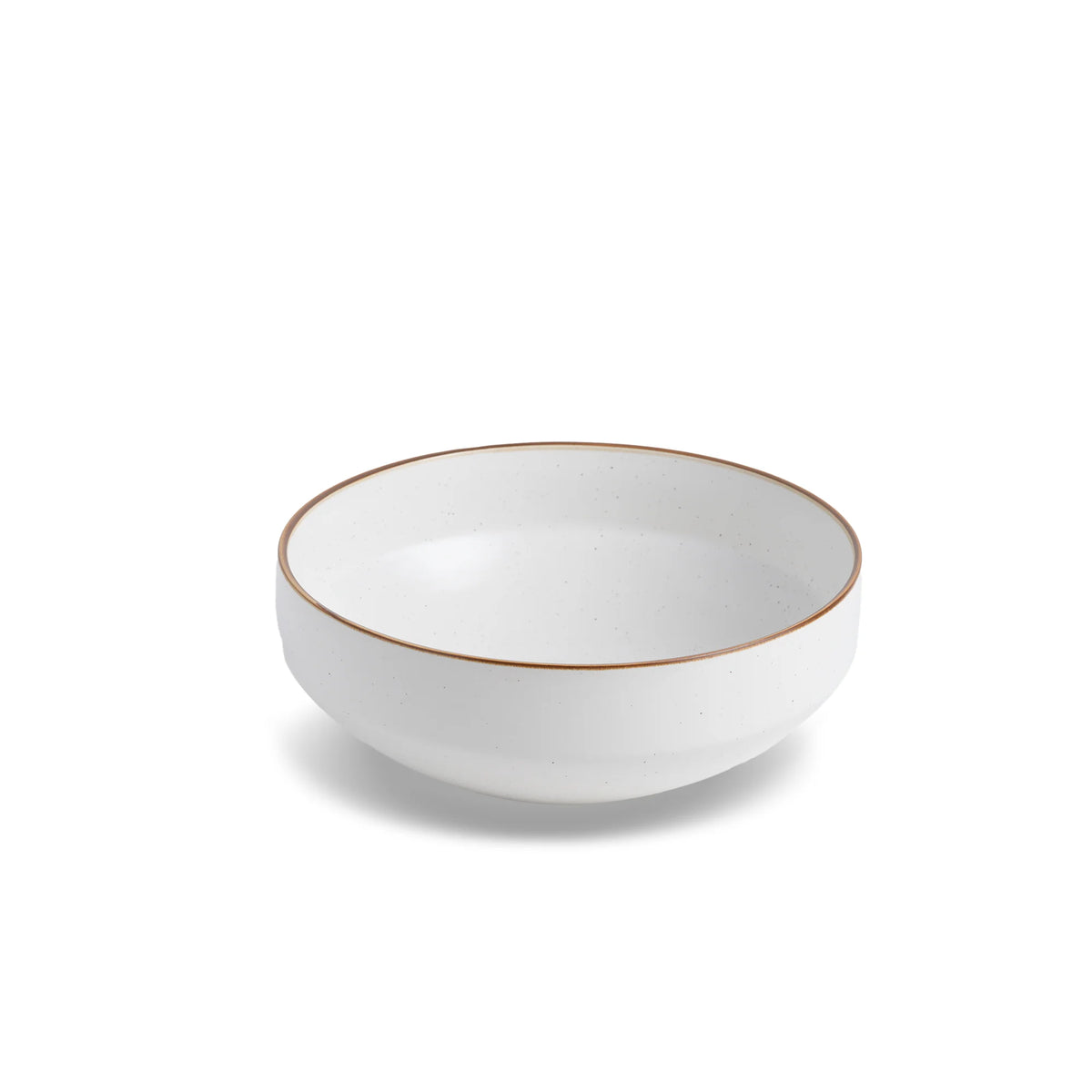 White ceramic bowl with a thin brown rim on a white background