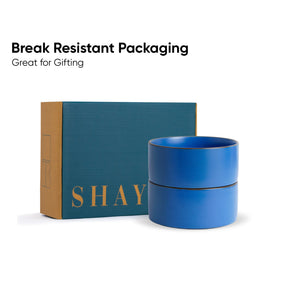 Blue cylindrical container with 'SHAY' branding next to a teal box on a white background.