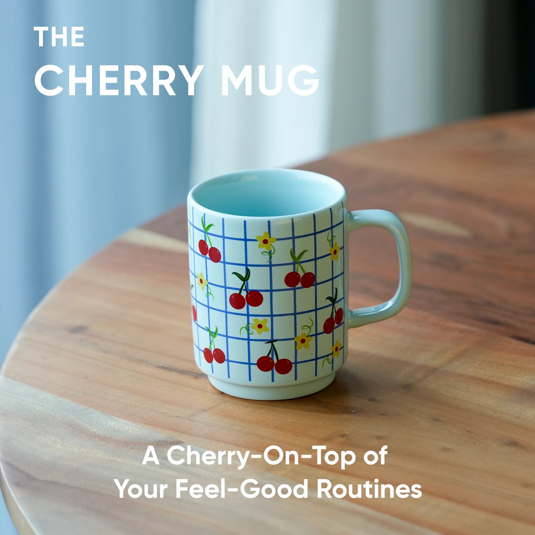 Mug with cherry design on a wooden table