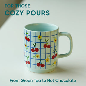 Mug with cherry and grid pattern on a light background with text about beverages.