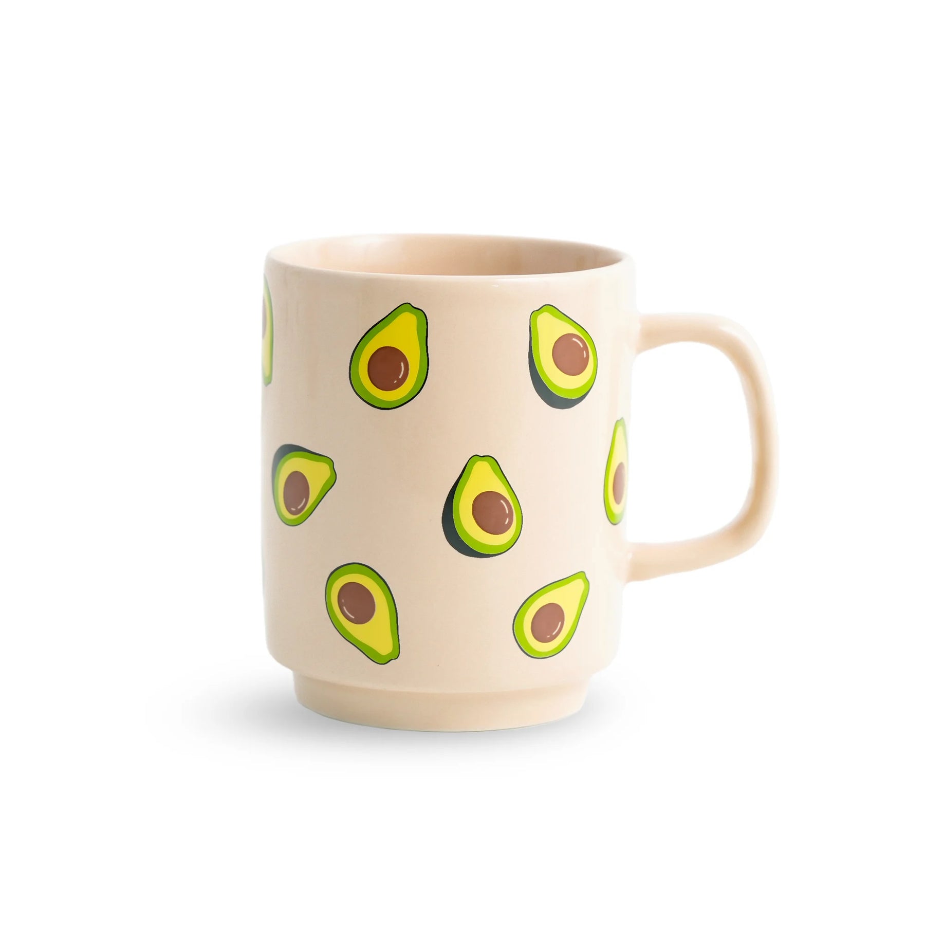 Beige mug with avocado designs on a white background