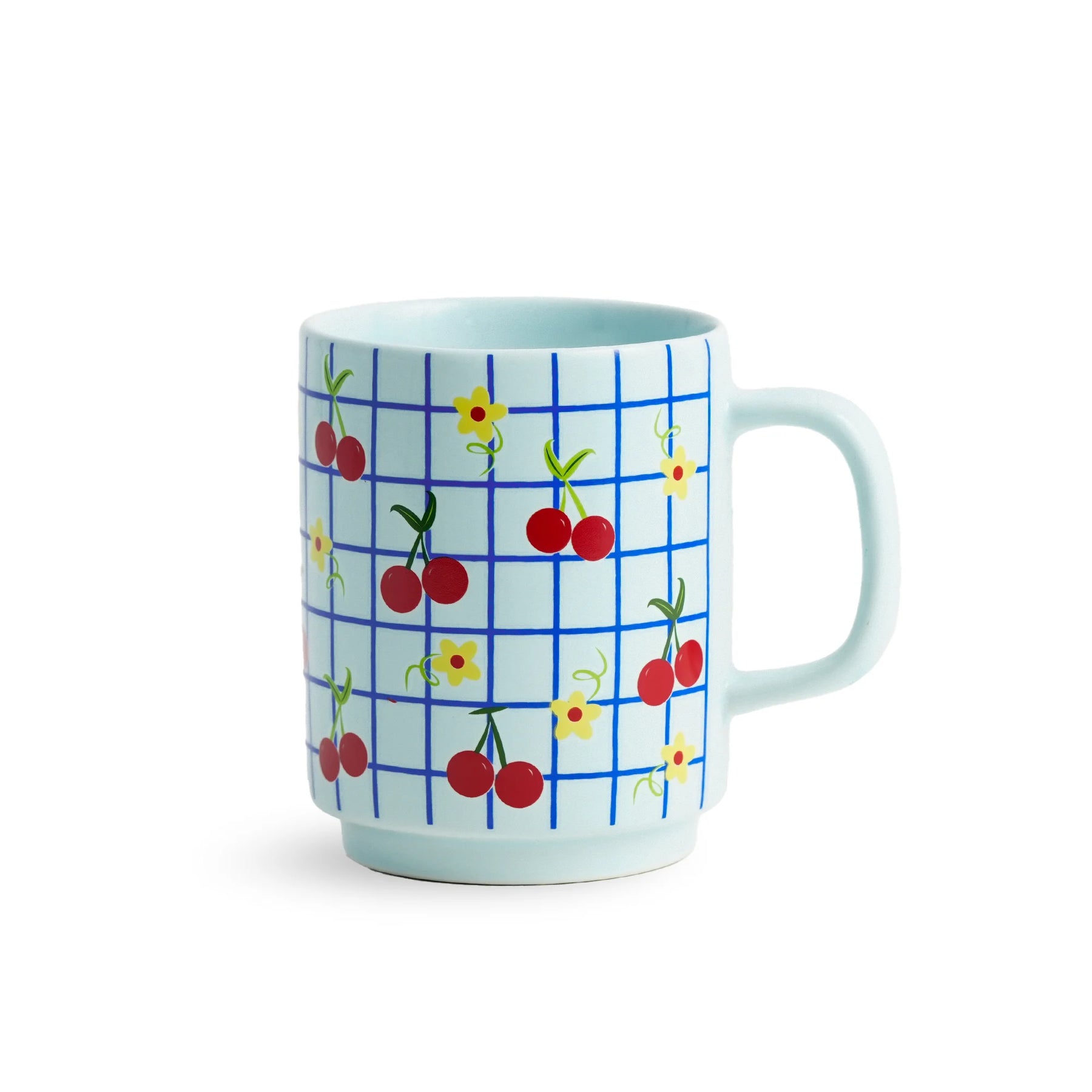 Mug with cherry and flower pattern on a blue checkered background