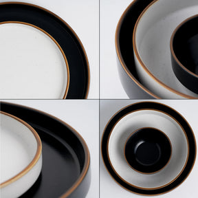 Set of ceramic plates with black and gold rims on a white background