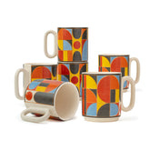 Set of ceramic mugs with geometric pattern on a white background