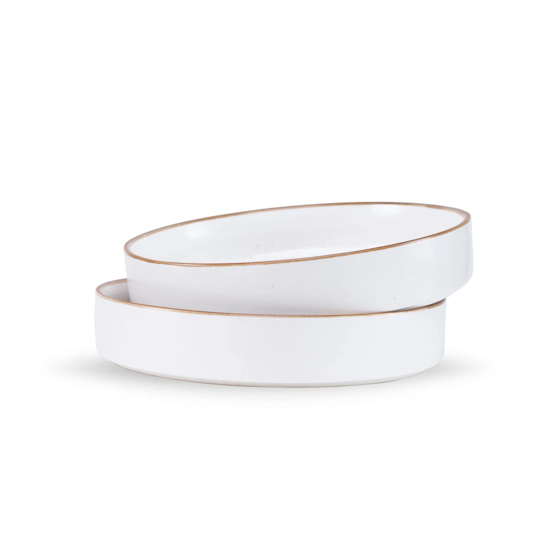 Two white ceramic bowls with gold rims on a white background