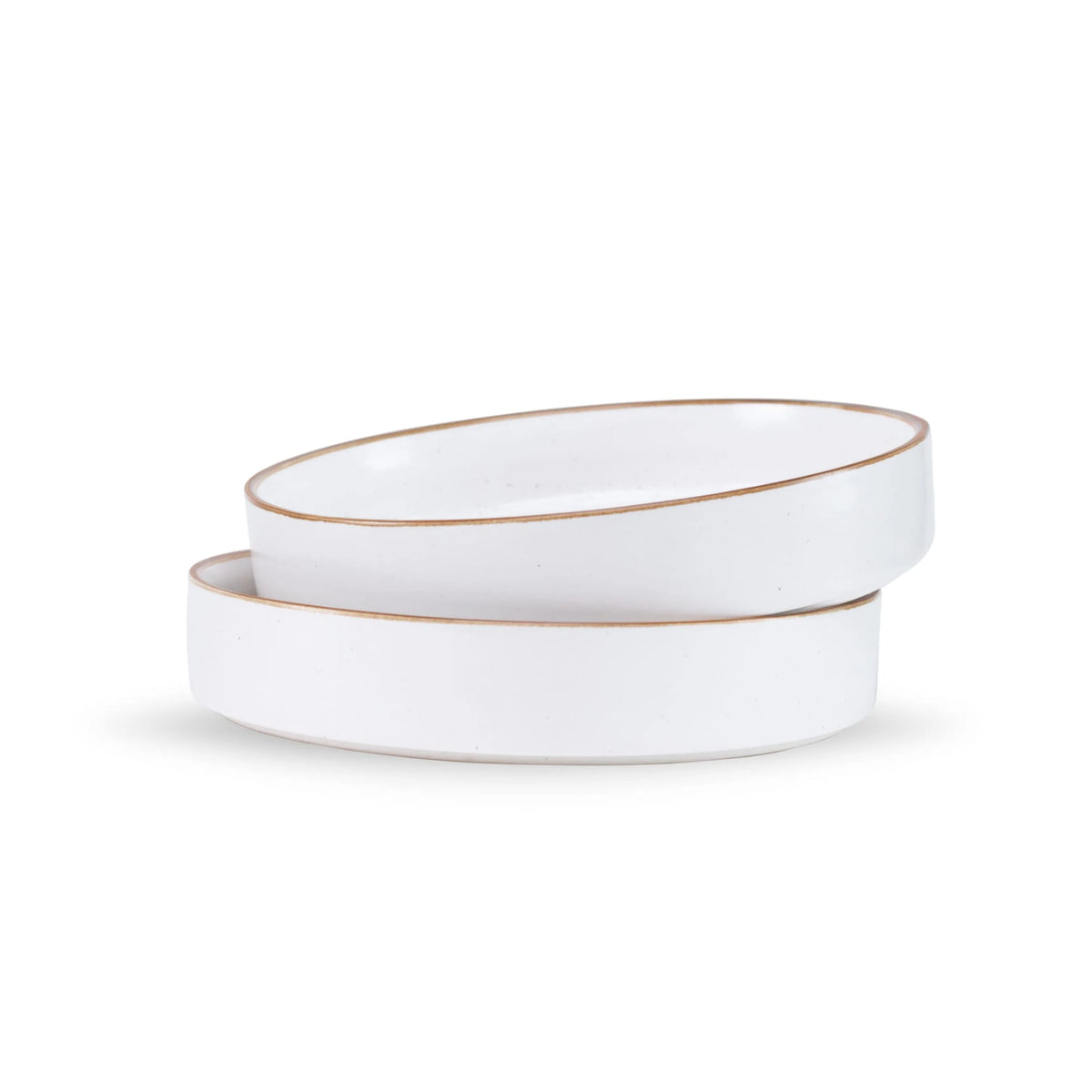 Two white ceramic bowls with gold rims on a white background
