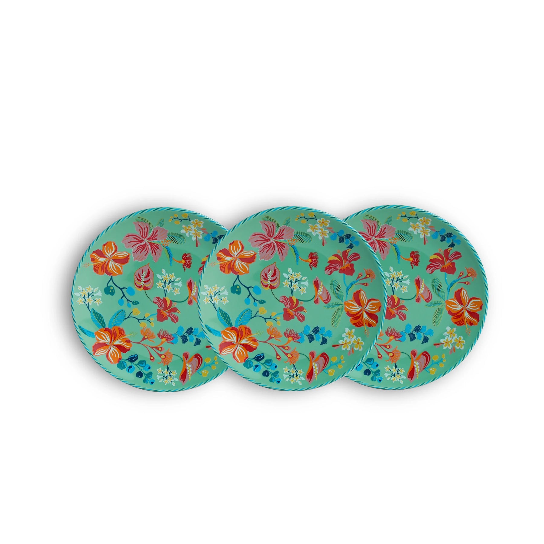 Three floral-patterned plates on a white background