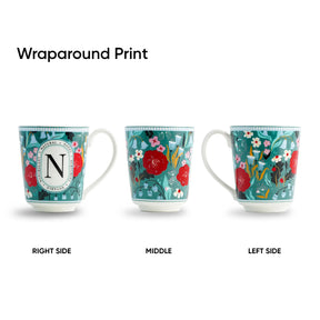 Three mugs with floral wraparound prints on a white background