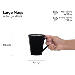Black mug held by a hand with measurements and volume details on a white background