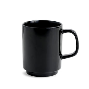 Black mug on a white background