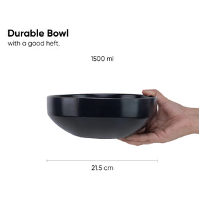 Black bowl held by a hand with text indicating its capacity and dimensions.