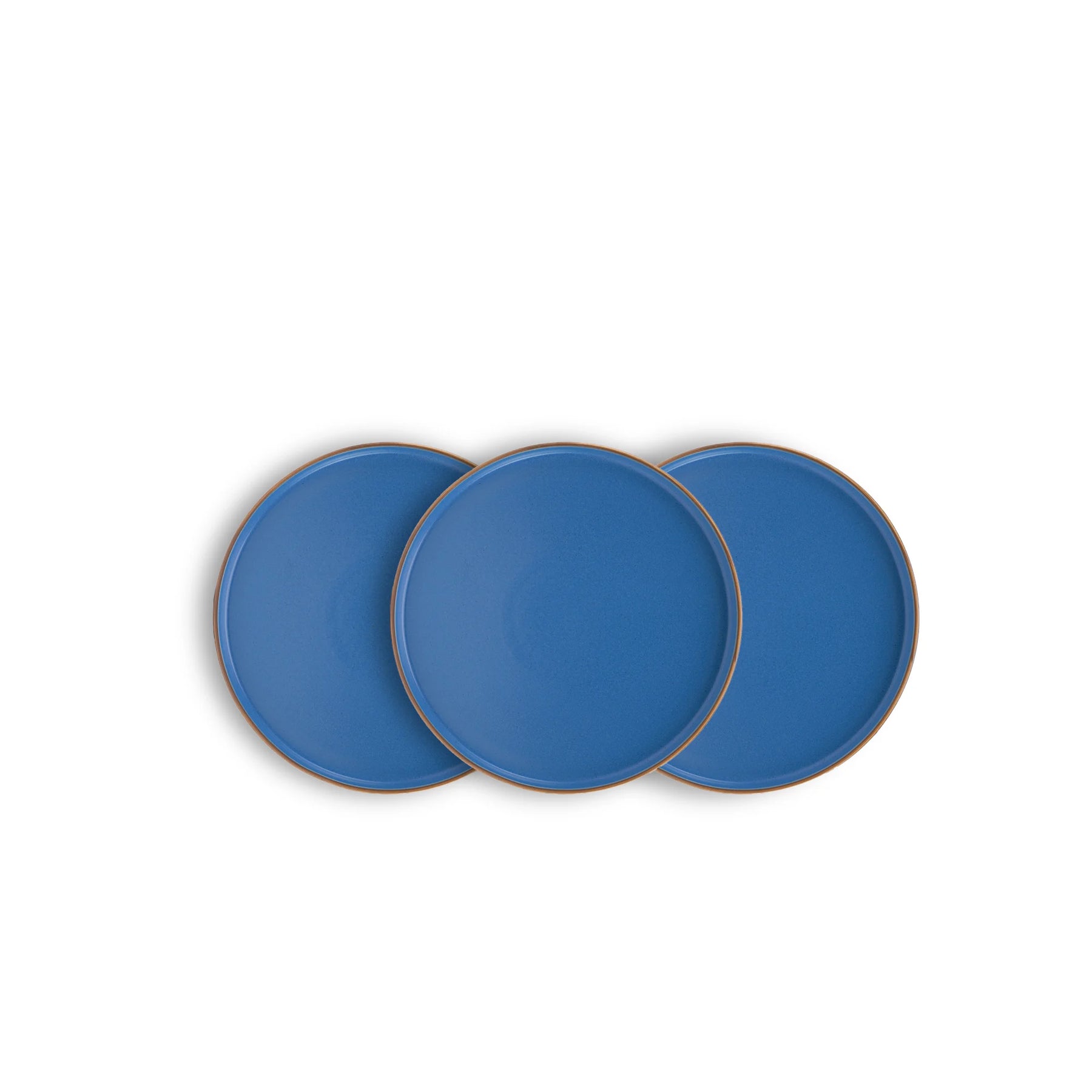 Three blue plates with gold rims on a white background