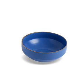 Blue ceramic bowl on a white background