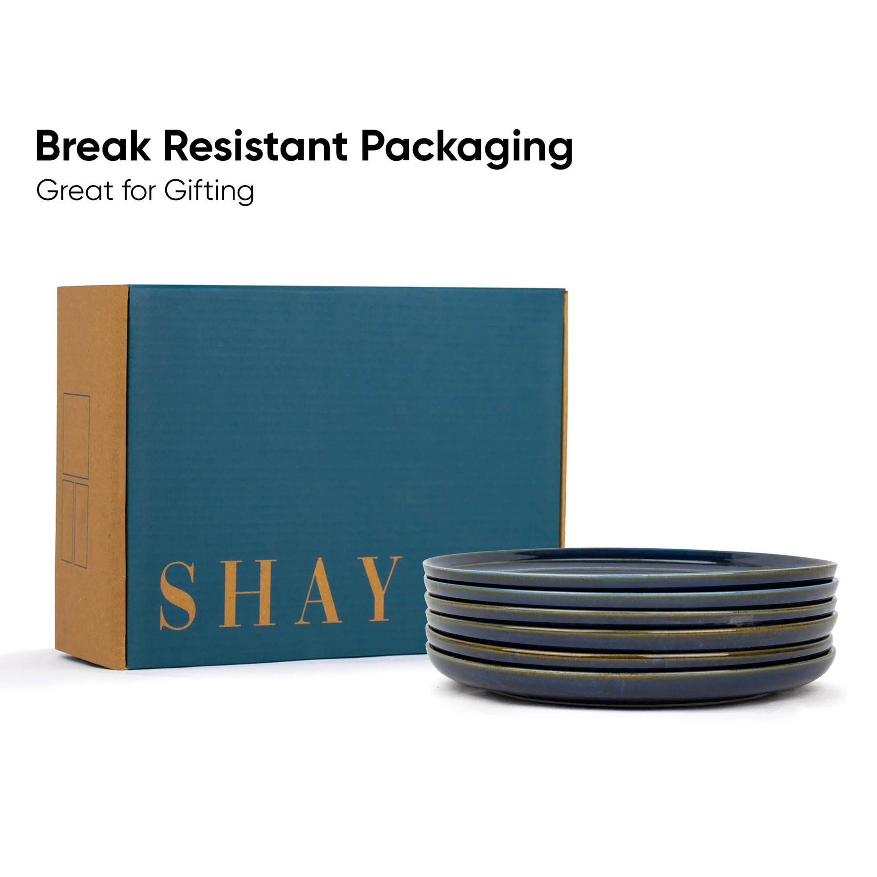 Stack of blue ceramic bowls with 'SHAY' branded box on a white background