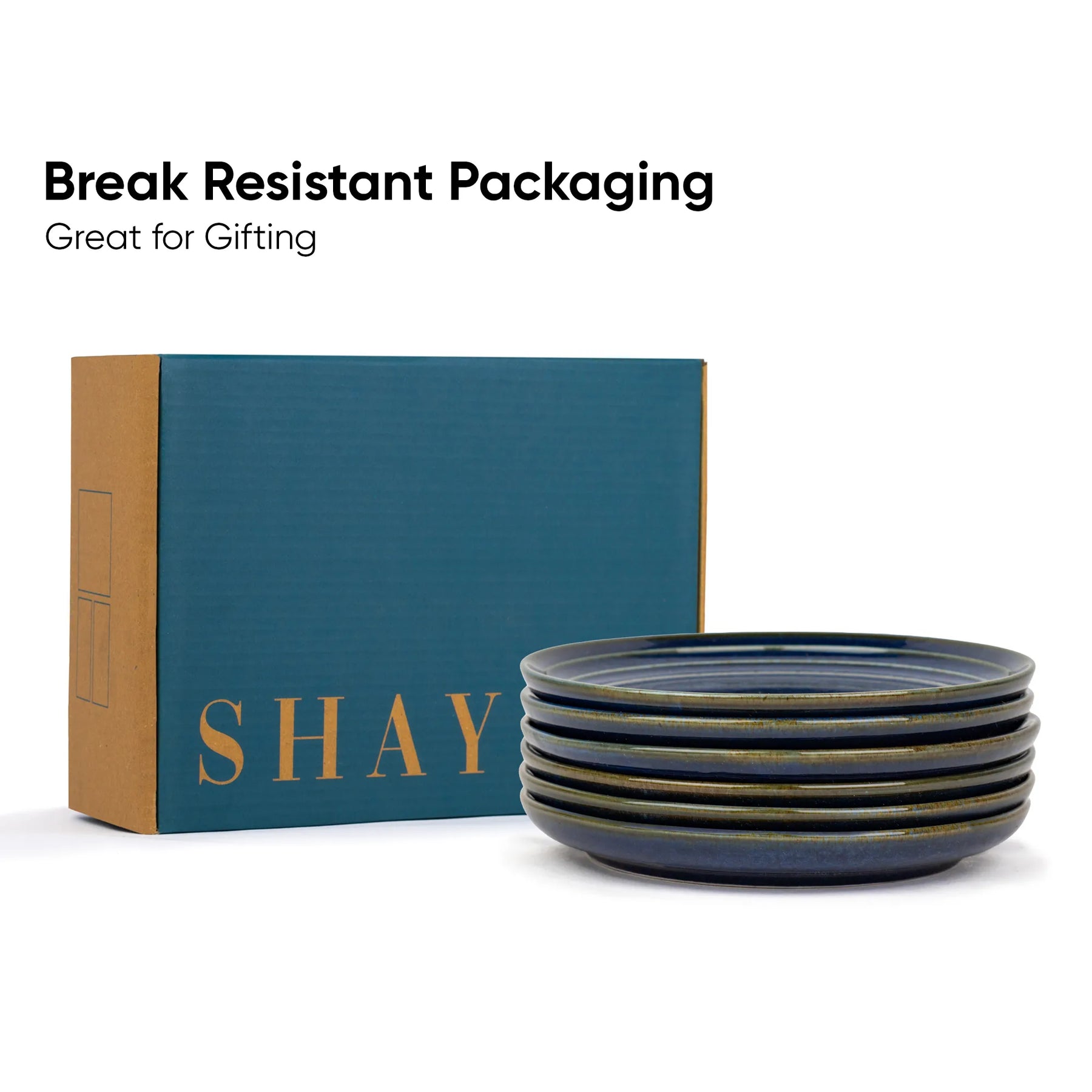 Stack of blue ceramic bowls with 'SHAY' branded box on a white background