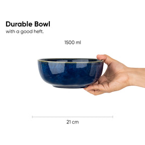 Blue ceramic bowl held by a hand with text indicating its capacity and dimensions.