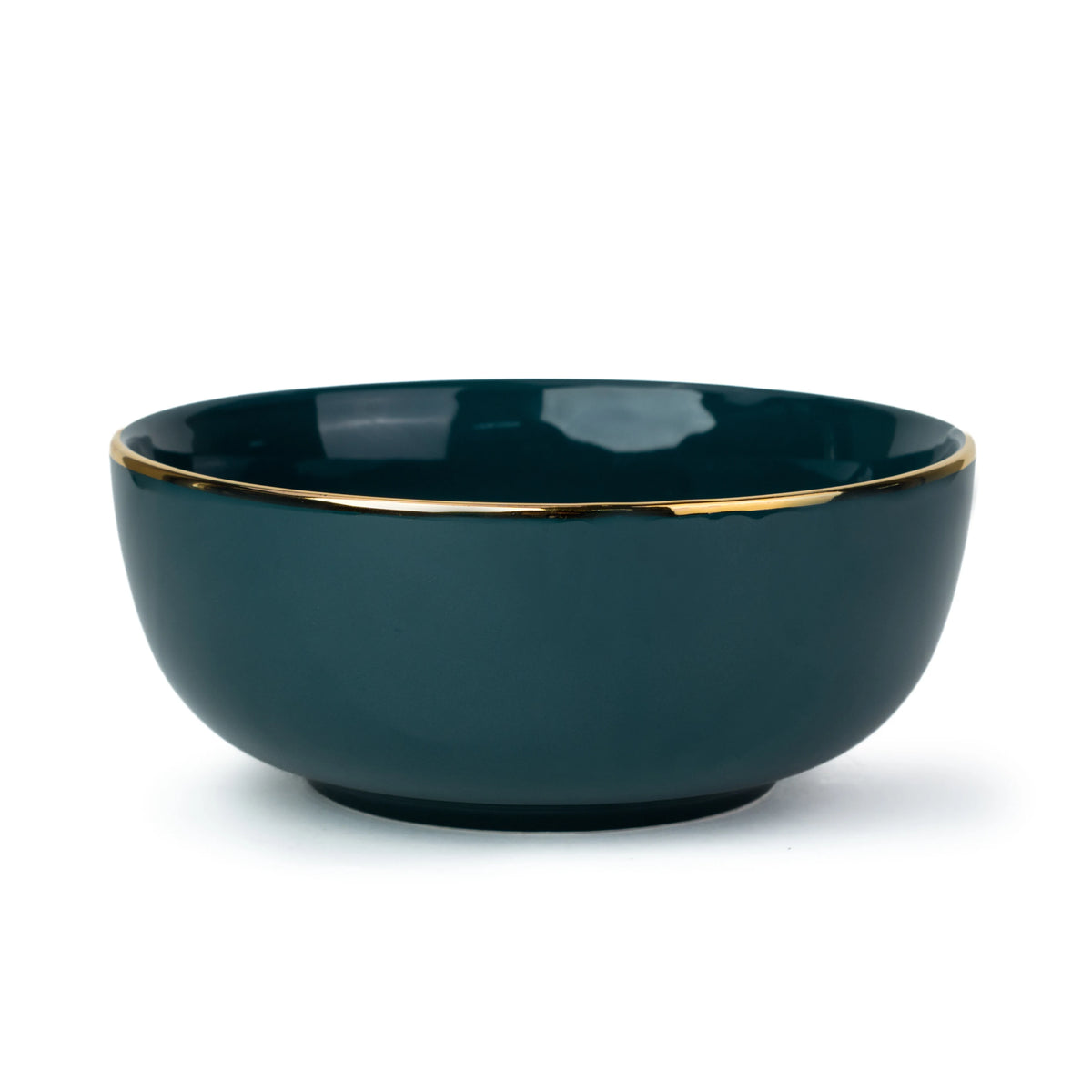 Dark blue ceramic bowl with gold rim on a white background