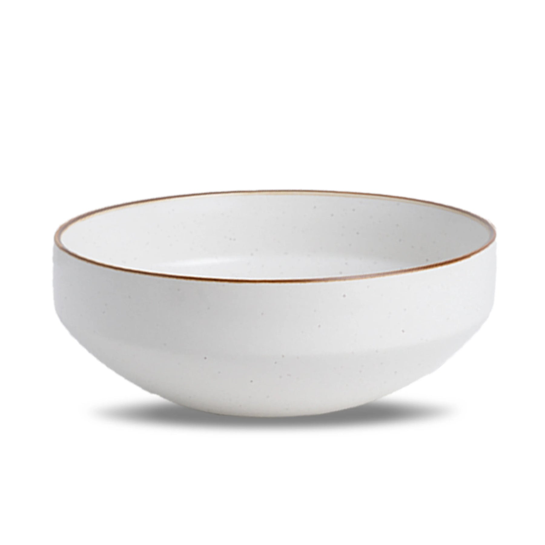 White ceramic bowl with a gold rim on a white background