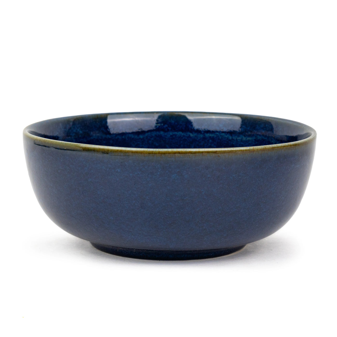 Blue ceramic bowl on a white background
