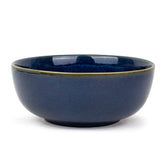 Blue ceramic bowl on a white background