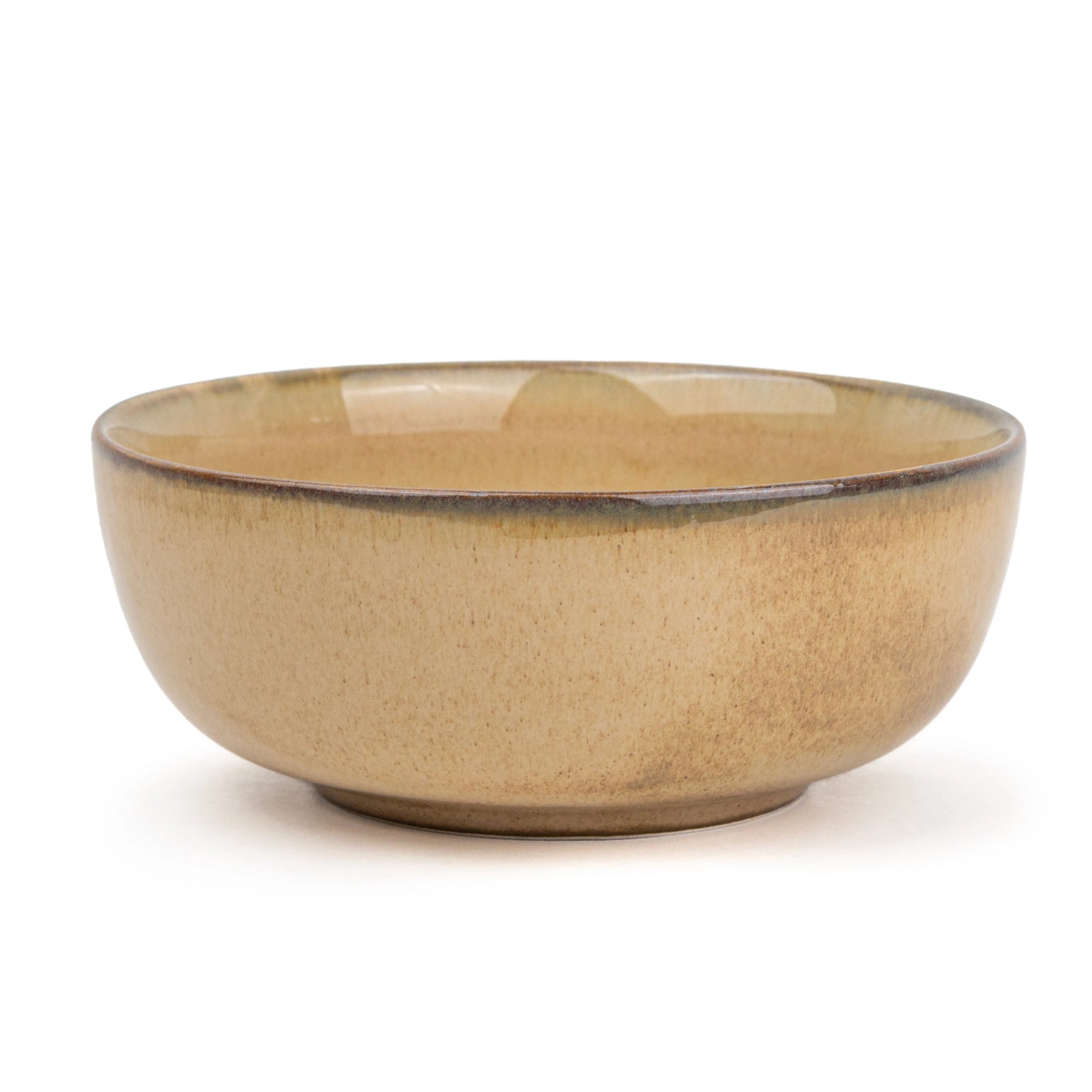 Beige ceramic bowl on a white background