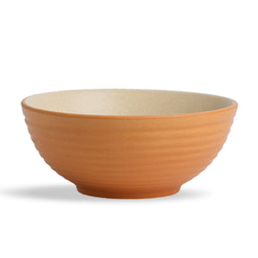 Orange ceramic bowl on a white background