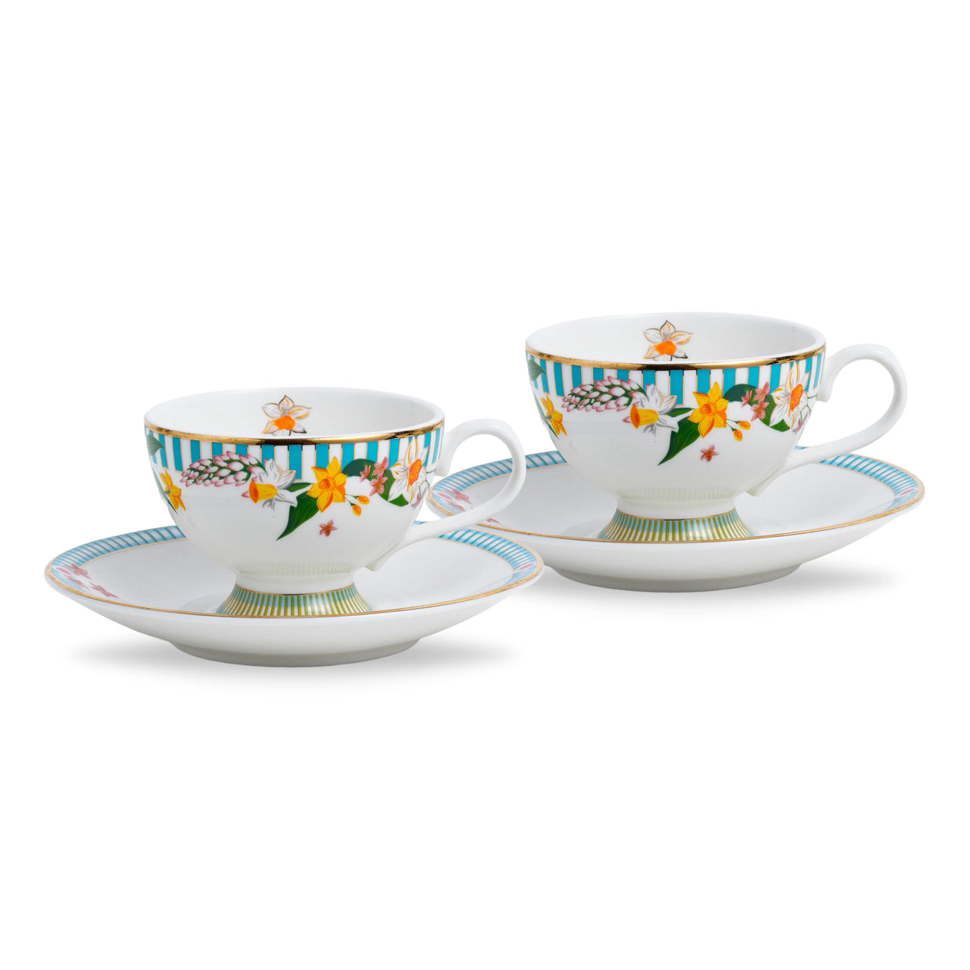 Two floral teacups and saucers on a white background