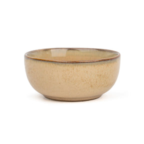 Beige ceramic bowl on a white background