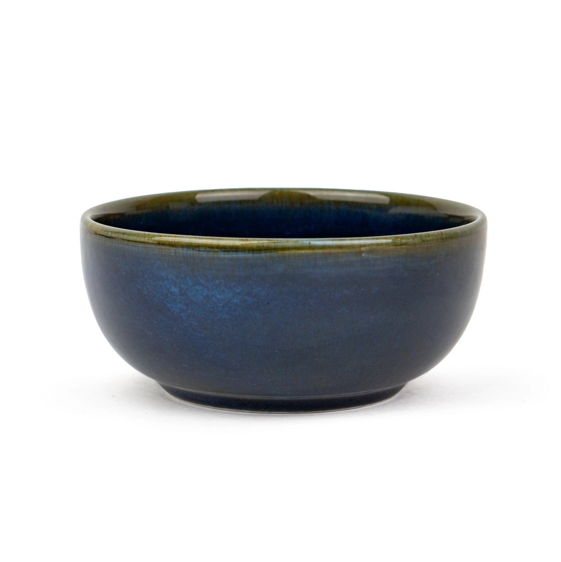 Blue ceramic bowl on a white background