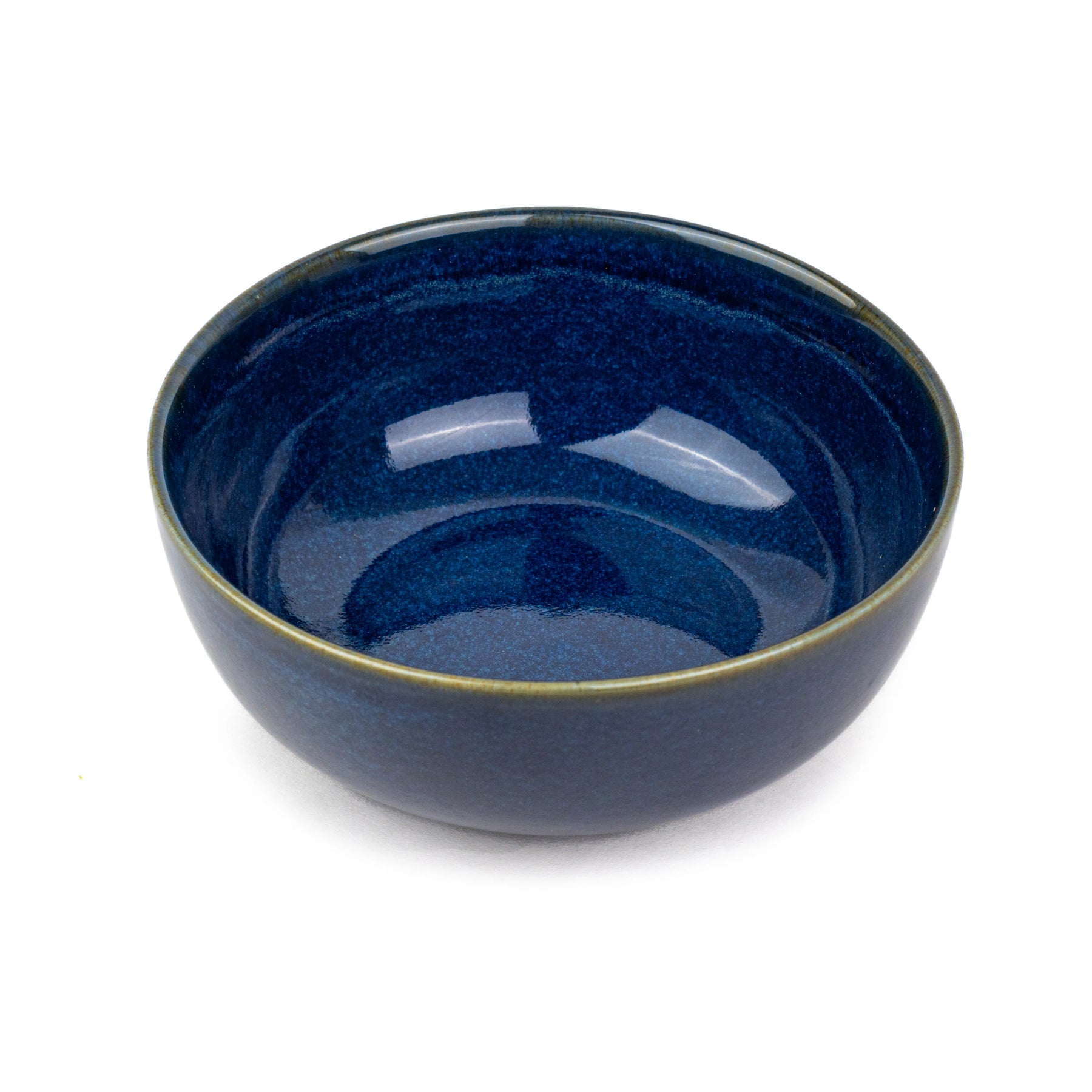 Blue ceramic bowl on a white background