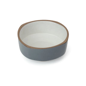 Ceramic bowl with brown rim and gray base on a white background