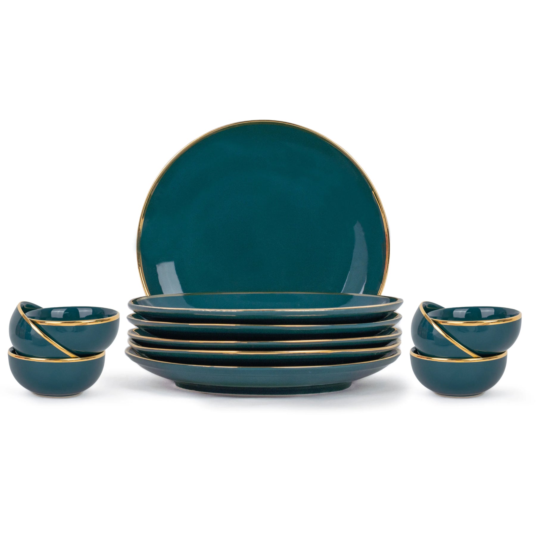 Set of teal ceramic plates and bowls with gold rims on a white background