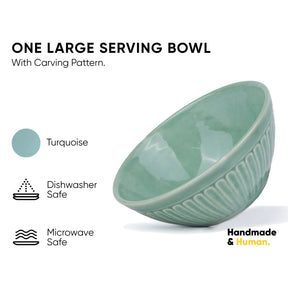 Turquoise serving bowl with carving pattern on a white background, featuring icons for dishwasher and microwave safety.