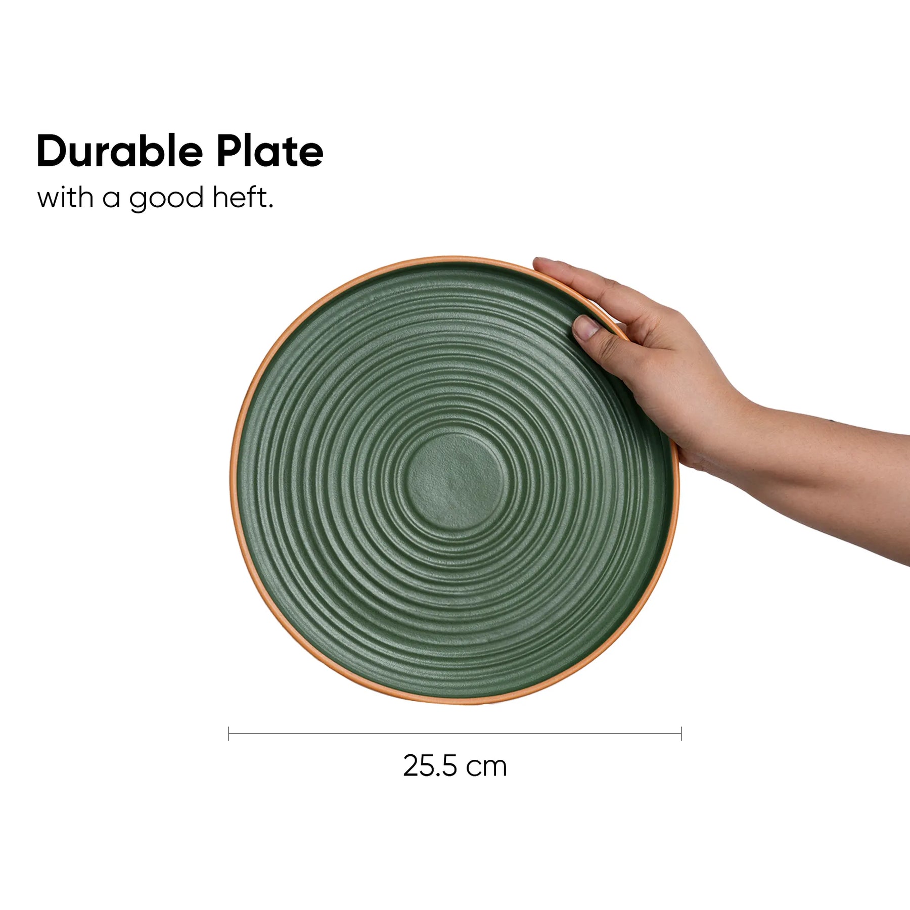 Green ceramic plate held by a hand with text indicating durability and dimensions.