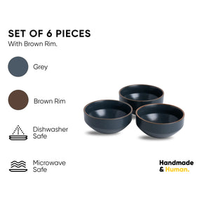 Set of three dark blue bowls with brown rims on a white background, featuring text and icons about material and safety.