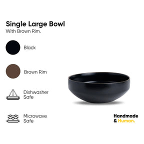 Black bowl with brown rim on a white background, featuring safety and material information.