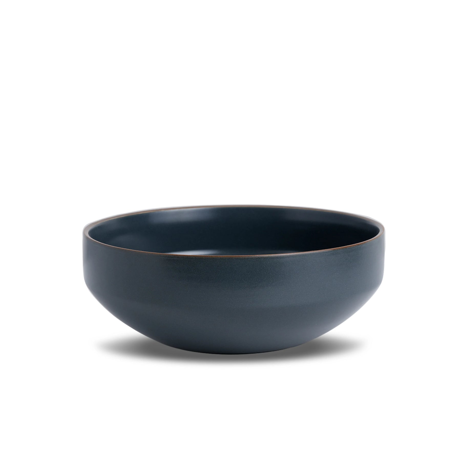 Dark blue ceramic bowl on a white background