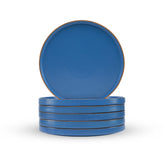 Set of blue plates with brown rim on a white background