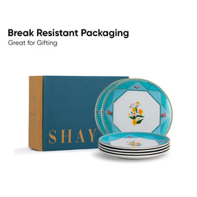 Set of decorative plates with floral design in 'SHAY' branded packaging on a white background.