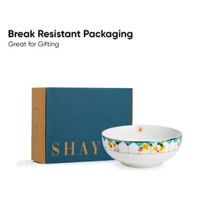 Decorative bowl with 'SHAY' branding and text about break-resistant packaging on a white background