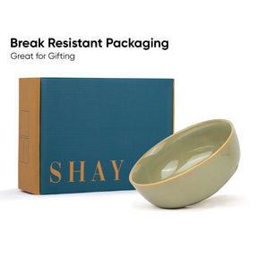 Green ceramic bowl with 'SHAY' branding on a blue box, text 'Break Resistant Packaging Great for Gifting'.