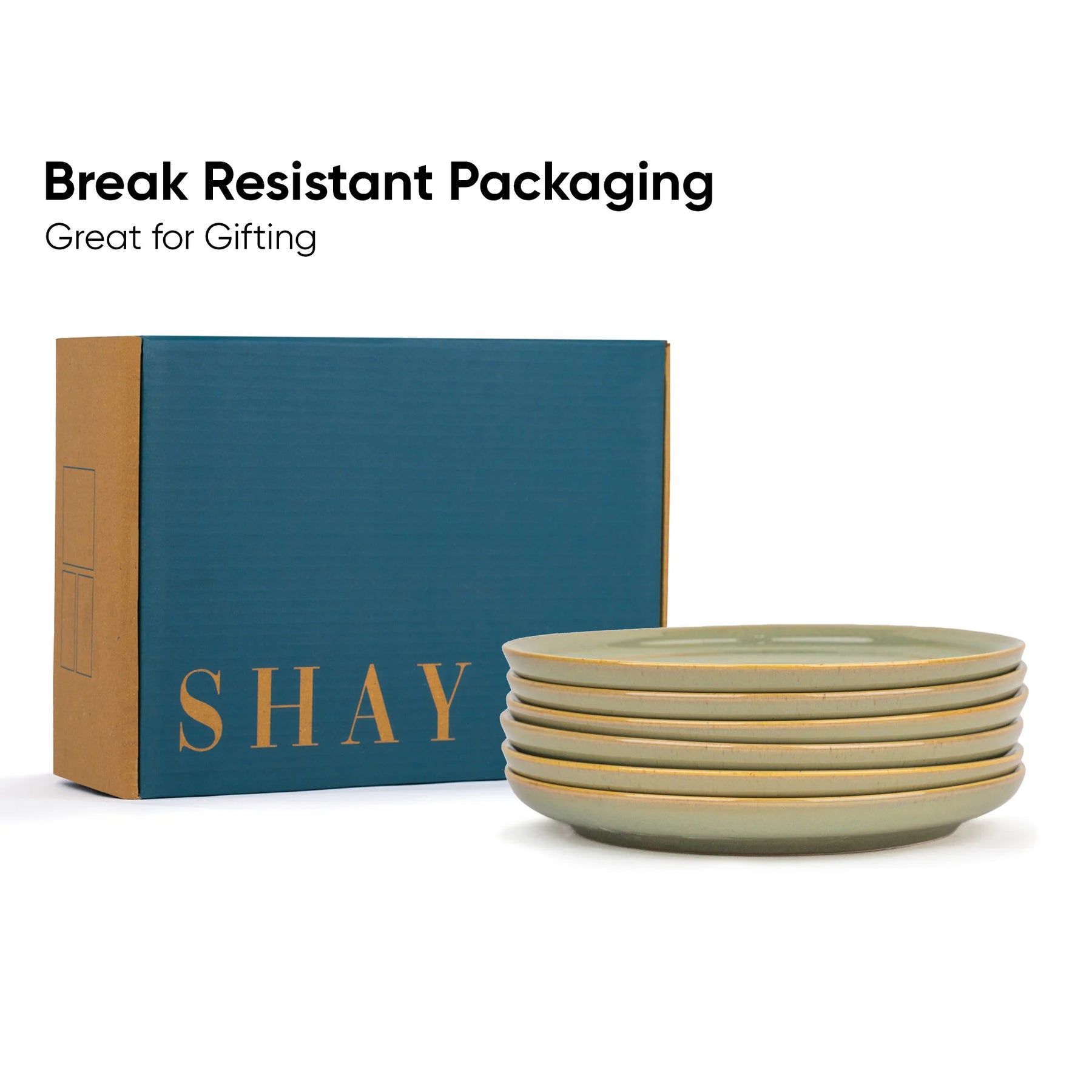 Stack of ceramic bowls with a 'SHAY' branded box on a white background