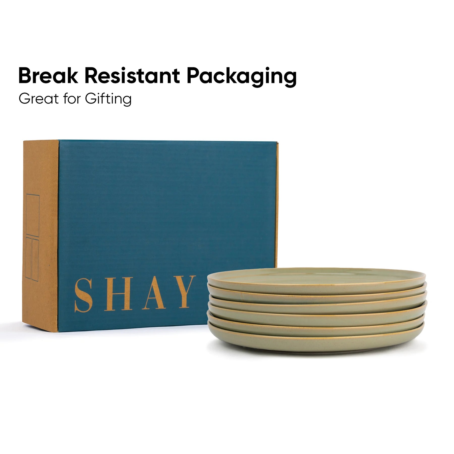 Stack of ceramic bowls in front of a 'SHAY' branded box with text about break-resistant packaging.