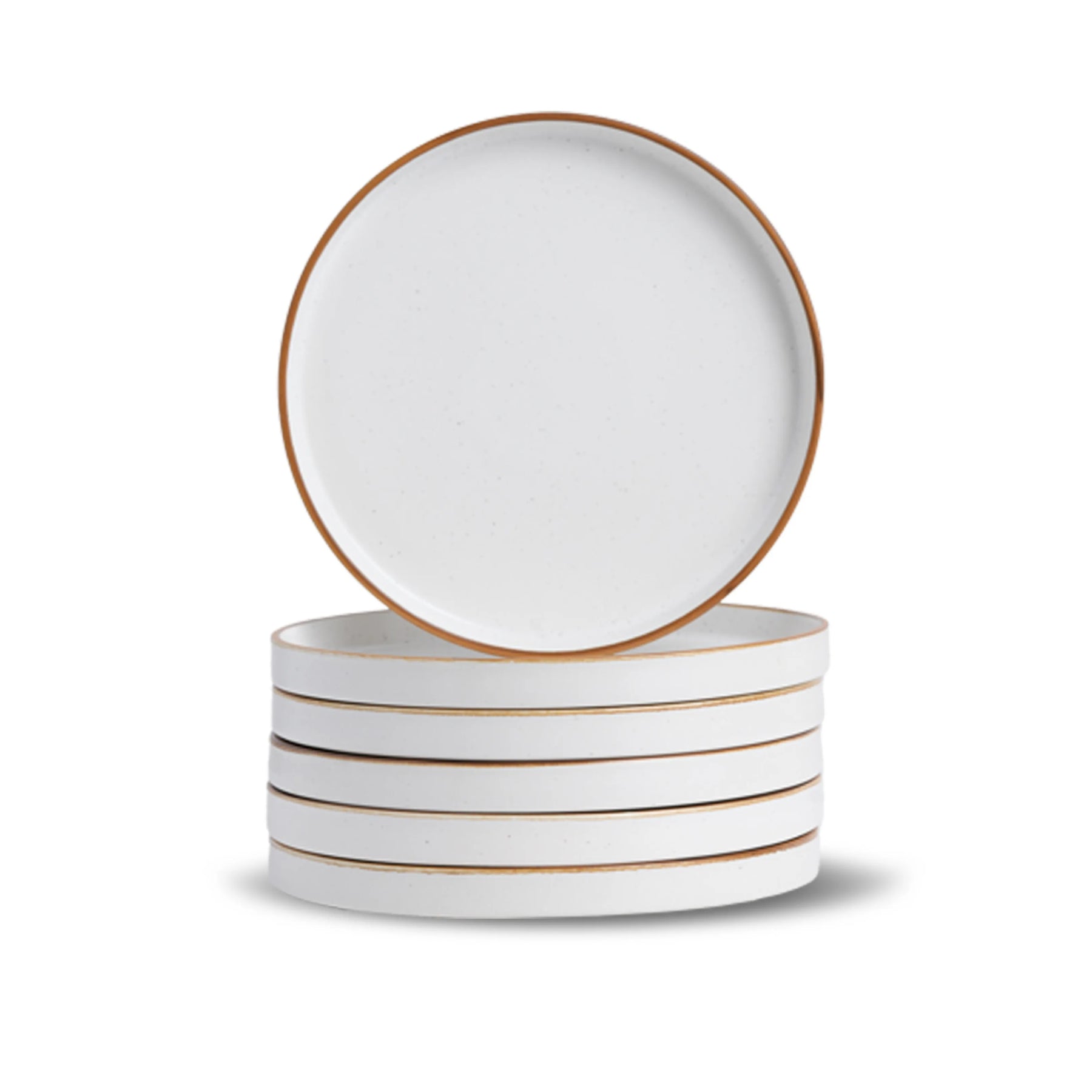 Set of four white ceramic plates with gold rims on a white background